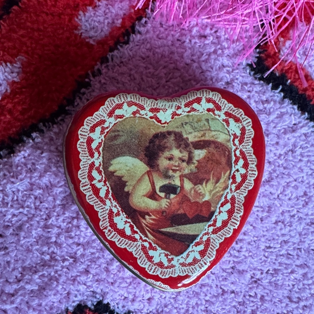 Vintage Valentines Day Red Heart-Shaped Tin with Angel Design